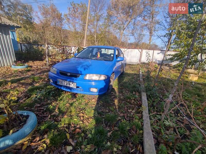 Седан Mazda 323 1997 в Христиновке
