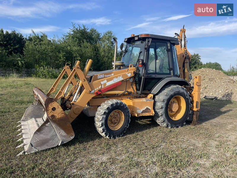 Экскаватор погрузчик Case Construction 590 SL 2003 в Калуше