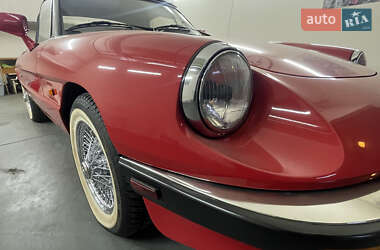 Кабриолет Alfa Romeo Spider 1987 в 