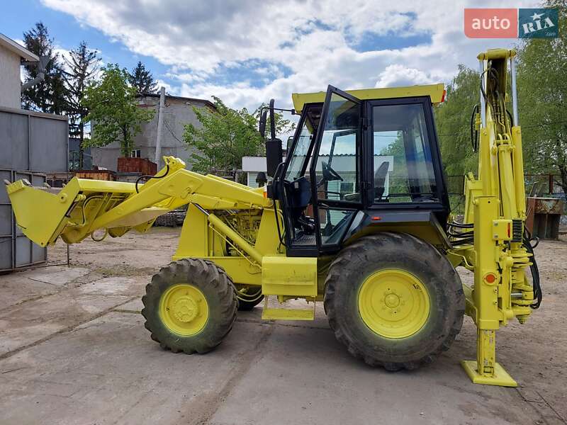 Екскаватор навантажувач АТЕК 999 2006 в Подільську