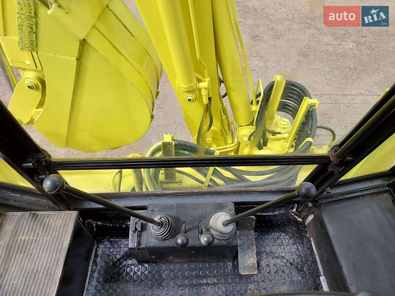 Екскаватор навантажувач АТЕК 999 2006 в Подільську