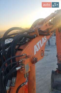Экскаватор погрузчик Atlas 1404 2002 в 