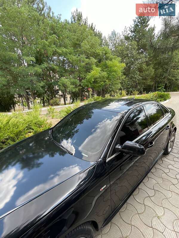 Седан Audi A4 2011 в Окнах