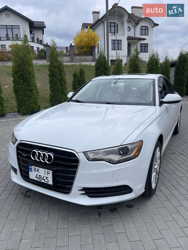 Седан Audi A6 2014 в  фото Седан Audi A6 2014 в