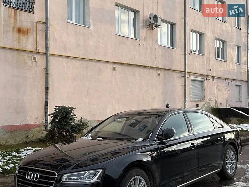 2017 Audi A8, VIN WAUZZZ4H6HN015907:plate — фото 1 (autoria)