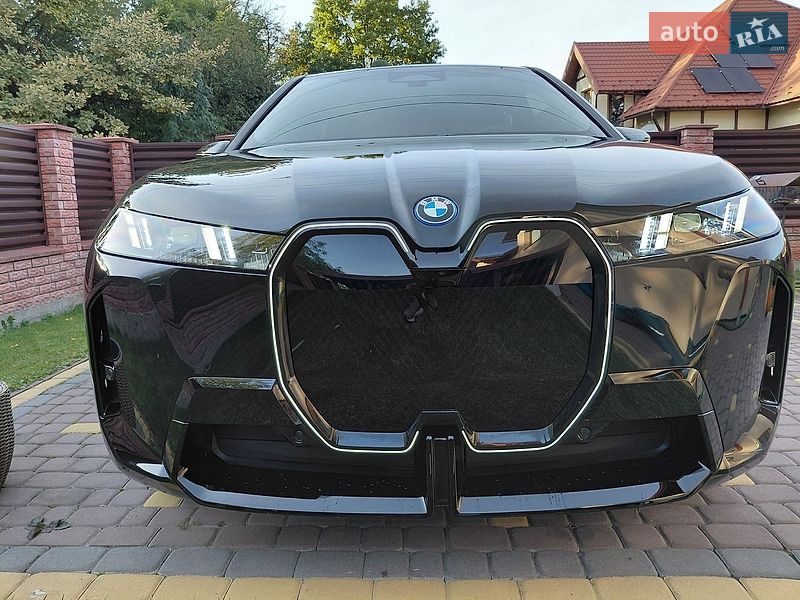 2026 BMW IX, VIN WB543CF08TCW71917:plate — photo 1 (autoria)