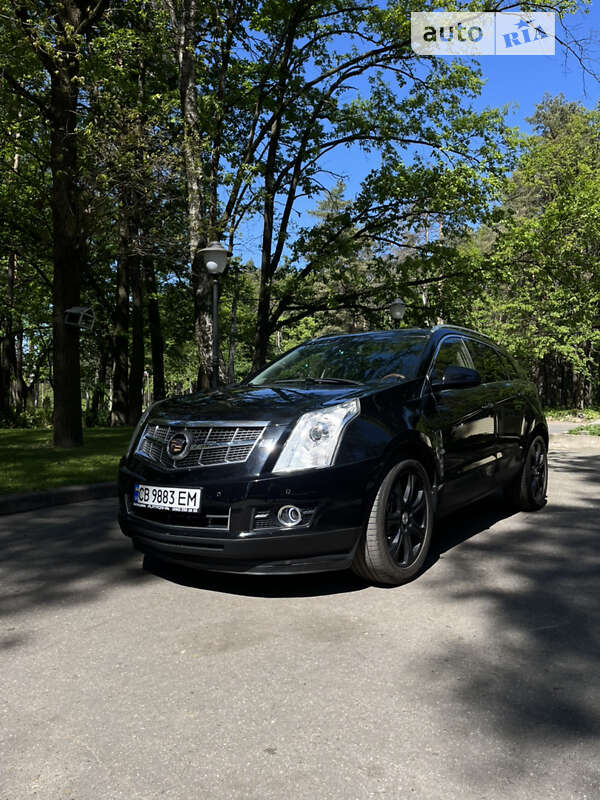 Внедорожник / Кроссовер Cadillac SRX 2011 в 