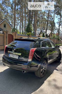 Внедорожник / Кроссовер Cadillac SRX 2011 в 