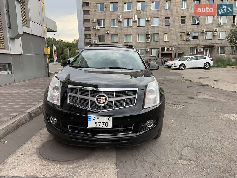 Внедорожник / Кроссовер Cadillac SRX 2011 в 