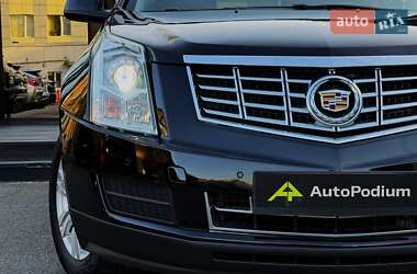 Внедорожник / Кроссовер Cadillac SRX 2014 в 