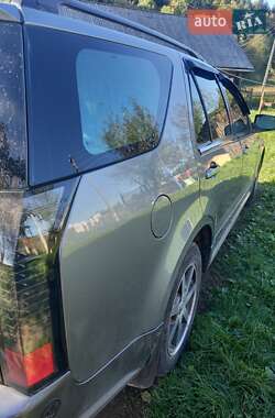 Позашляховик / Кросовер Cadillac SRX 2004 в 