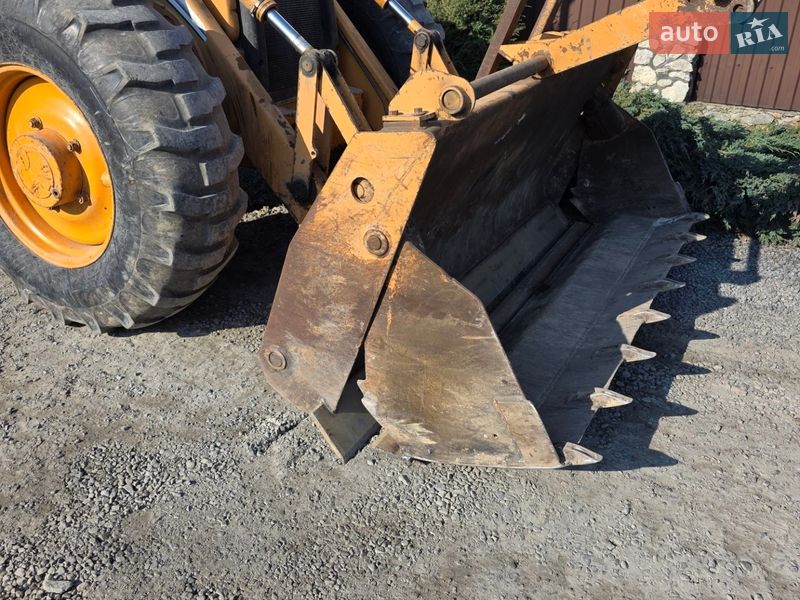 Экскаватор погрузчик Case Construction 695 SR-4 PS 2010 в Кременце