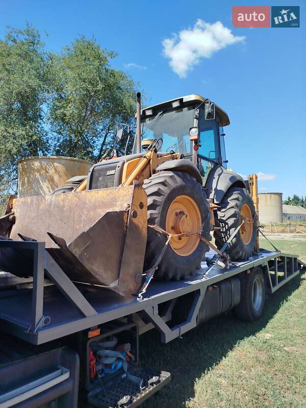 Экскаватор погрузчик Case Construction 695 ST 2008 в 