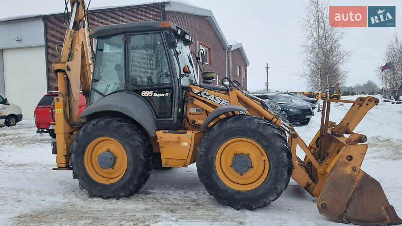 Экскаватор погрузчик Case Construction 695 ST 2009 в Одессе