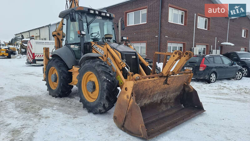 Экскаватор погрузчик Case Construction 695 ST 2009 в Одессе