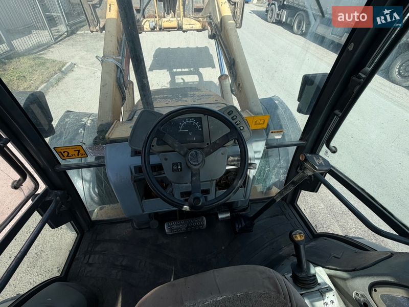 Экскаватор погрузчик Case Construction 695 ST 2002 в Радомышле