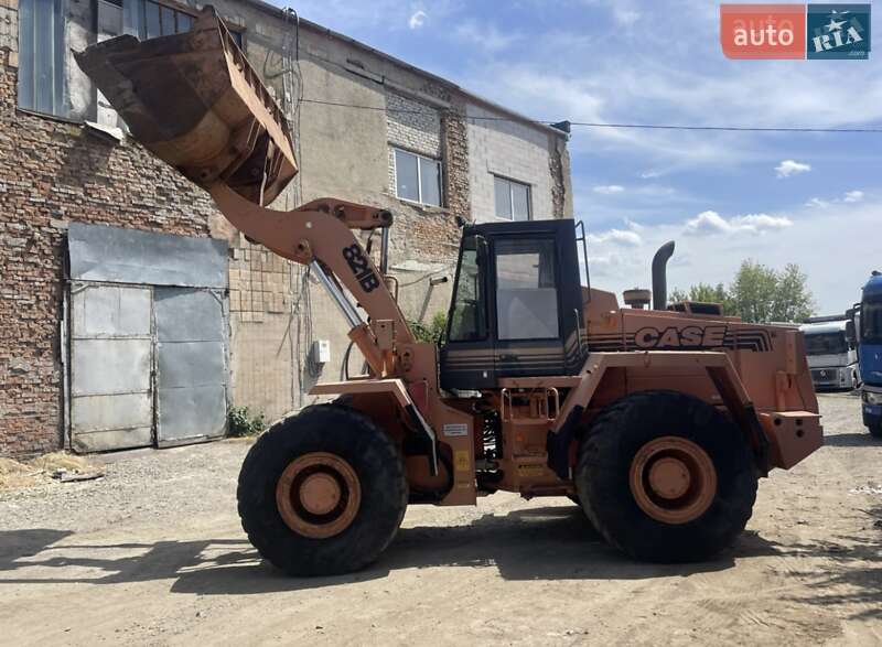 Фронтальні навантажувачі Case Construction 821E 1995 в  фото Фронтальні навантажувачі Case Construction 821E 1995 в