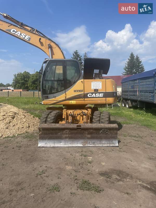 Колесный экскаватор Case Construction WX 165 2007 в 