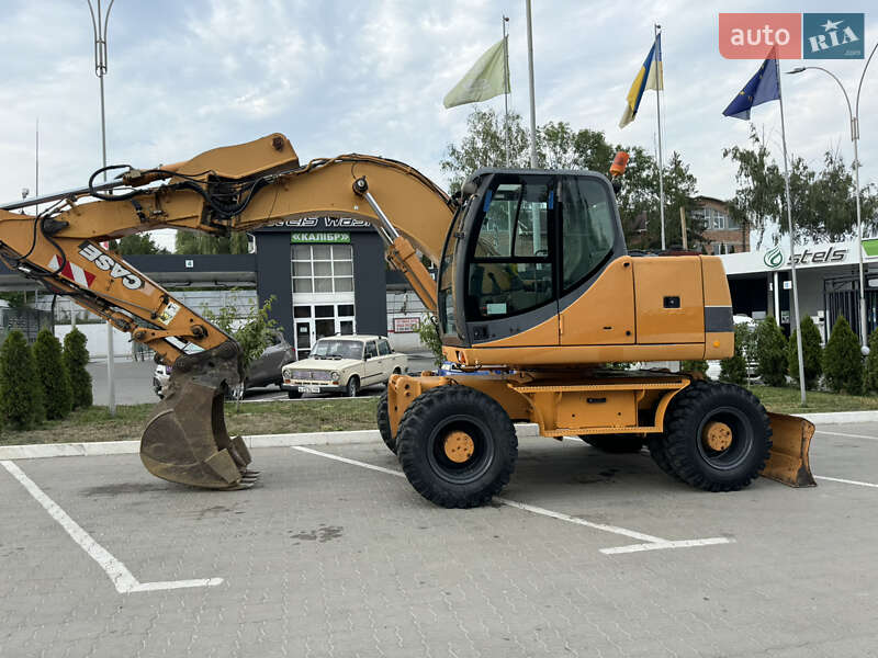 Колесный экскаватор Case Construction WX 165 2005 в 