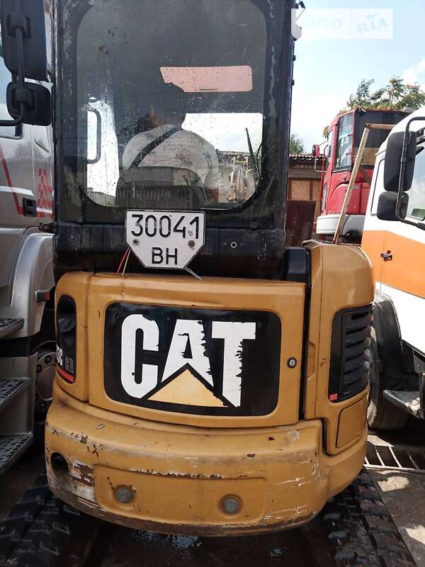 Экскаватор погрузчик Caterpillar 303 2007 в Одессе