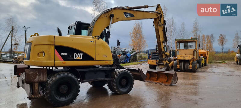 Колесный экскаватор Caterpillar 313 2010 в Одессе