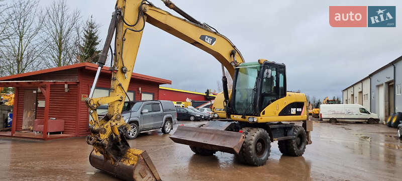 Колесный экскаватор Caterpillar 313 2010 в Одессе