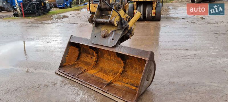 Колесный экскаватор Caterpillar 313 2010 в Одессе