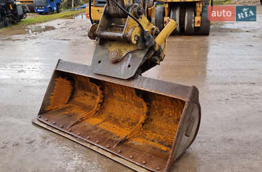 Колісний екскаватор Caterpillar 313 2010 в 