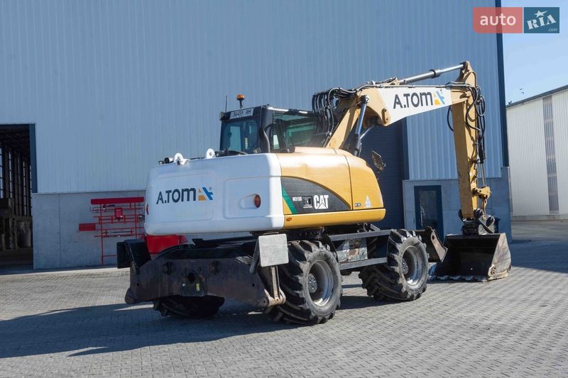 Колісний екскаватор Caterpillar 313 2012 в Житомирі