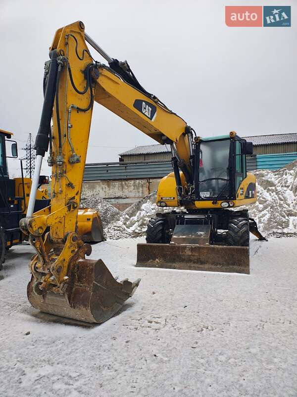 Колесный экскаватор Caterpillar 316 2009 в Николаеве