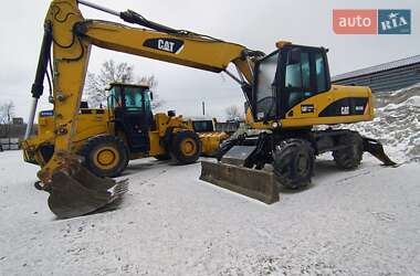 Колесный экскаватор Caterpillar 316 2009 в Николаеве