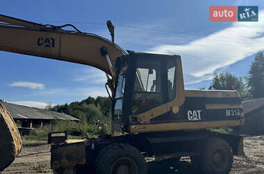 Экскаватор погрузчик Caterpillar 318 1999 в Ивано-Франковске