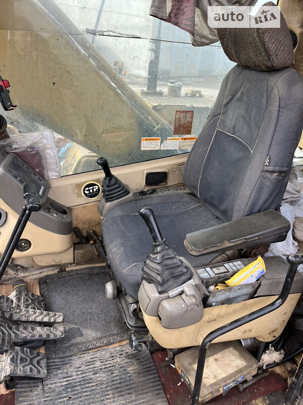 Экскаватор погрузчик Caterpillar 320 1998 в Запорожье