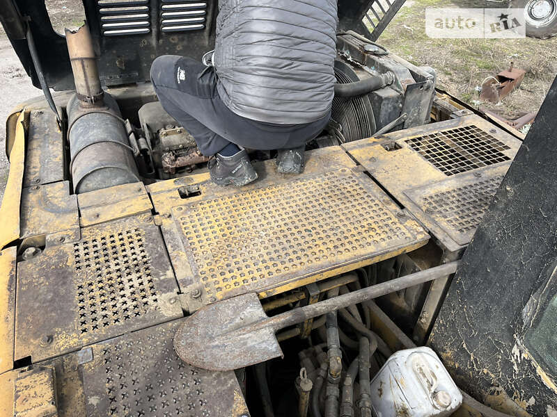 Экскаватор погрузчик Caterpillar 320 1998 в Запорожье