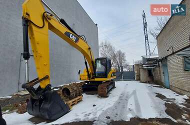 Гусеничный экскаватор Caterpillar 320 2007 в 