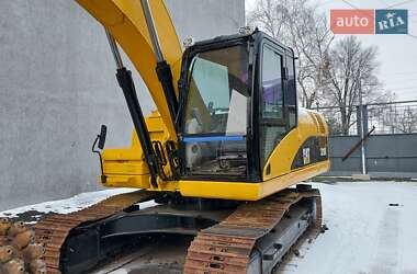 Гусеничный экскаватор Caterpillar 320 2007 в 