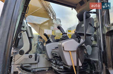 Гусеничный экскаватор Caterpillar 320 2014 в 
