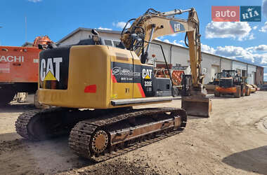 Гусеничный экскаватор Caterpillar 320 2013 в 