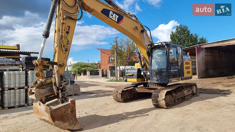 Гусеничный экскаватор Caterpillar 320 2013 в 