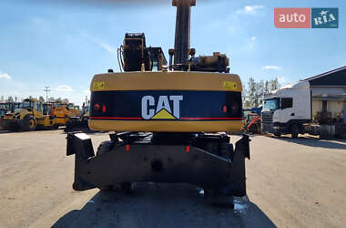 Экскаватор погрузчик Caterpillar 322 2007 в 