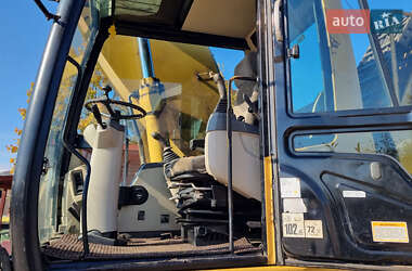 Экскаватор погрузчик Caterpillar 322 2007 в 
