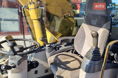 Экскаватор погрузчик Caterpillar 322 2007 в 