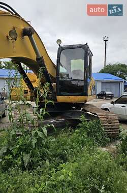 Экскаватор погрузчик Caterpillar 330 2008 в 