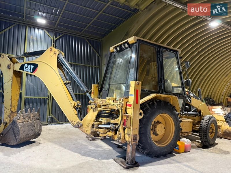 Колісний екскаватор Caterpillar 424 2007 в Хмельницькому