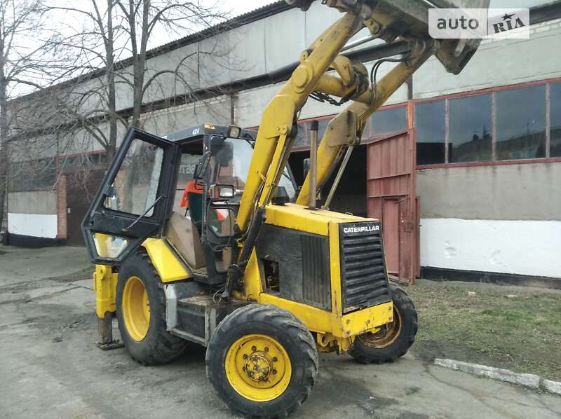 Екскаватор навантажувач Caterpillar 428 1992 в Марганці фото Екскаватор навантажувач Caterpillar 428 1992 в Марганці