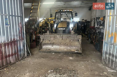 Экскаватор погрузчик Caterpillar 428 1999 в Малине