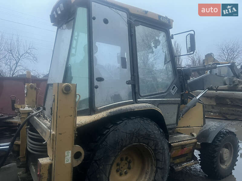 Екскаватор навантажувач Caterpillar 428E 1999 в Малині