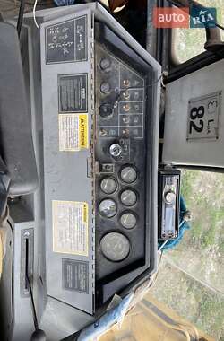 Екскаватор навантажувач Caterpillar 438 1995 в 