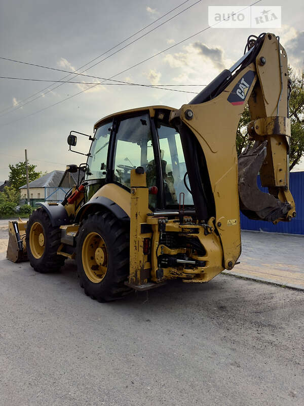 Экскаватор погрузчик Caterpillar 444 2014 в Павлограде