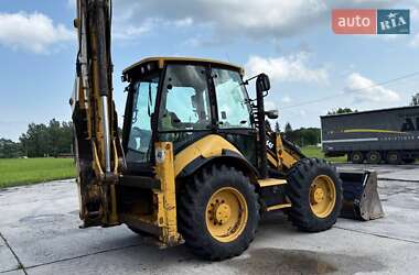 Экскаватор погрузчик Caterpillar 444 2014 в 